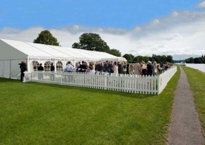 Corporate marquee with with bunting and picket fencing