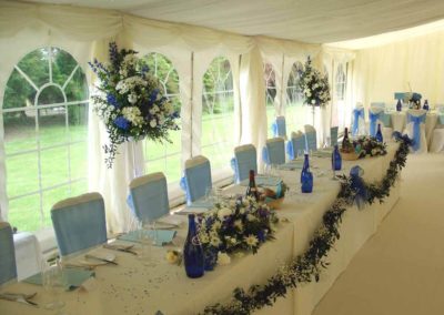 Interior cream and floral wedding marquee