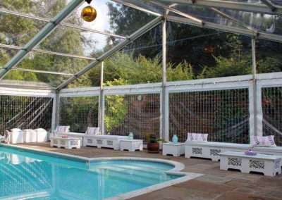 Image of clear PVC marquee constructed over the customer's swimming pool.