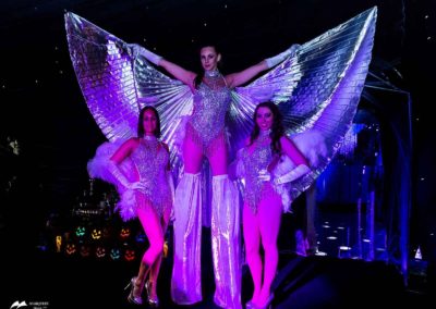 Image of glamorous Marquees Direct stilt dancers